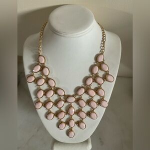 Charming Charle Pink bib style statement necklace